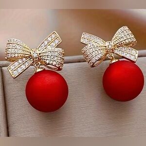 Elegant Gold and Red Bow Earrings